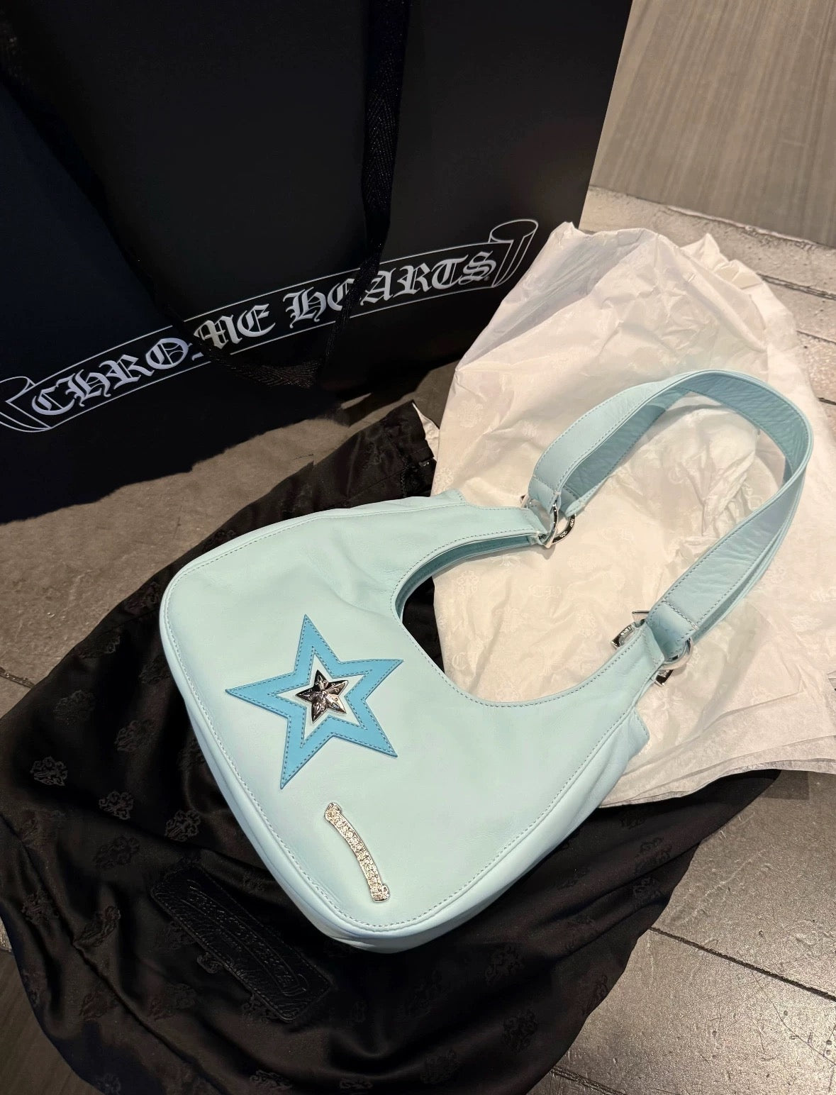 Archive blue chrome bag