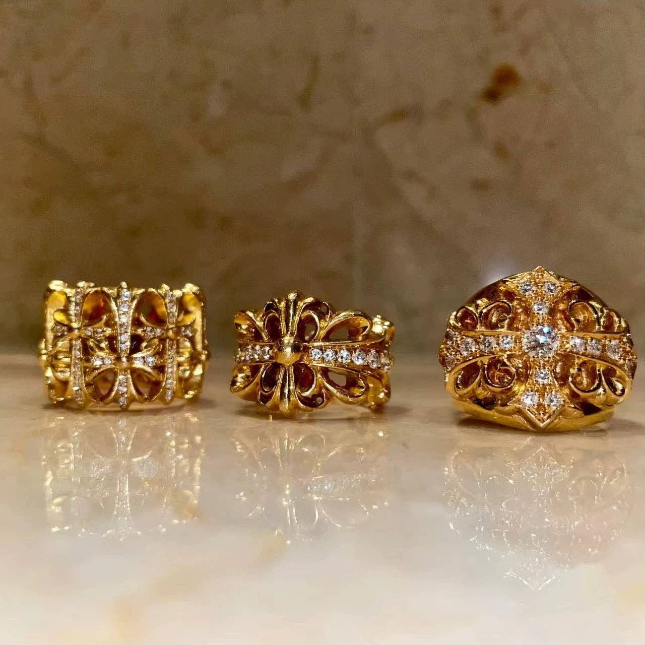 Gold Chrome hearts rings with diamond gemstone