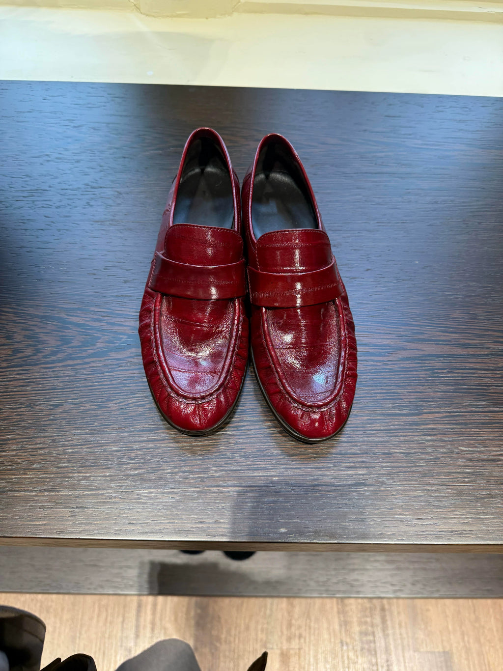 Bordeaux ruched eel leather loafers — pair, top view