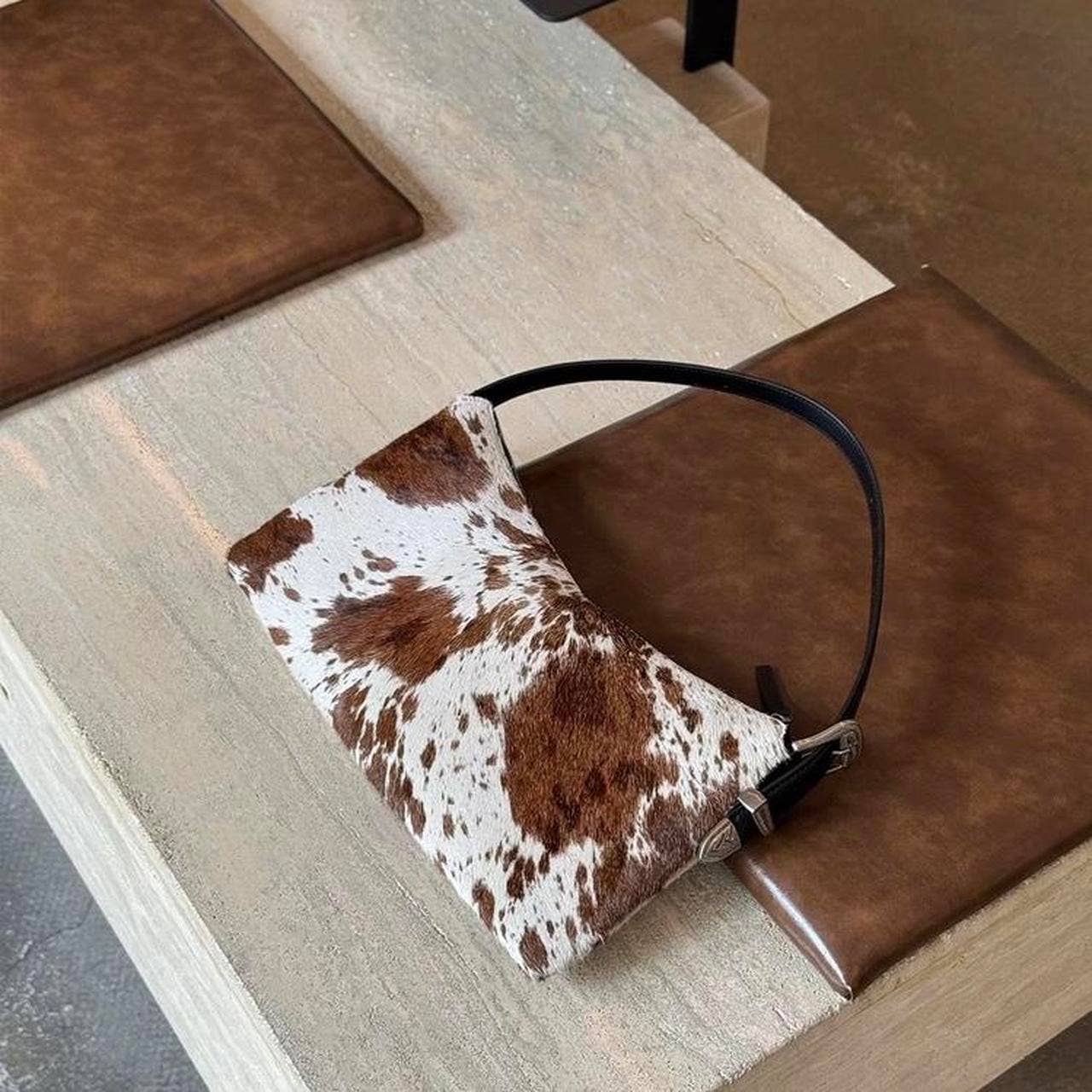 Brown and white cow print shoulder Bags