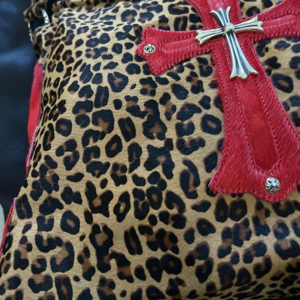 Leopard print cross purse with red cross appliqué