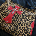 Leopard print cross purse with red cross appliqué