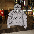 Gray zip up hoodie with black polka dots