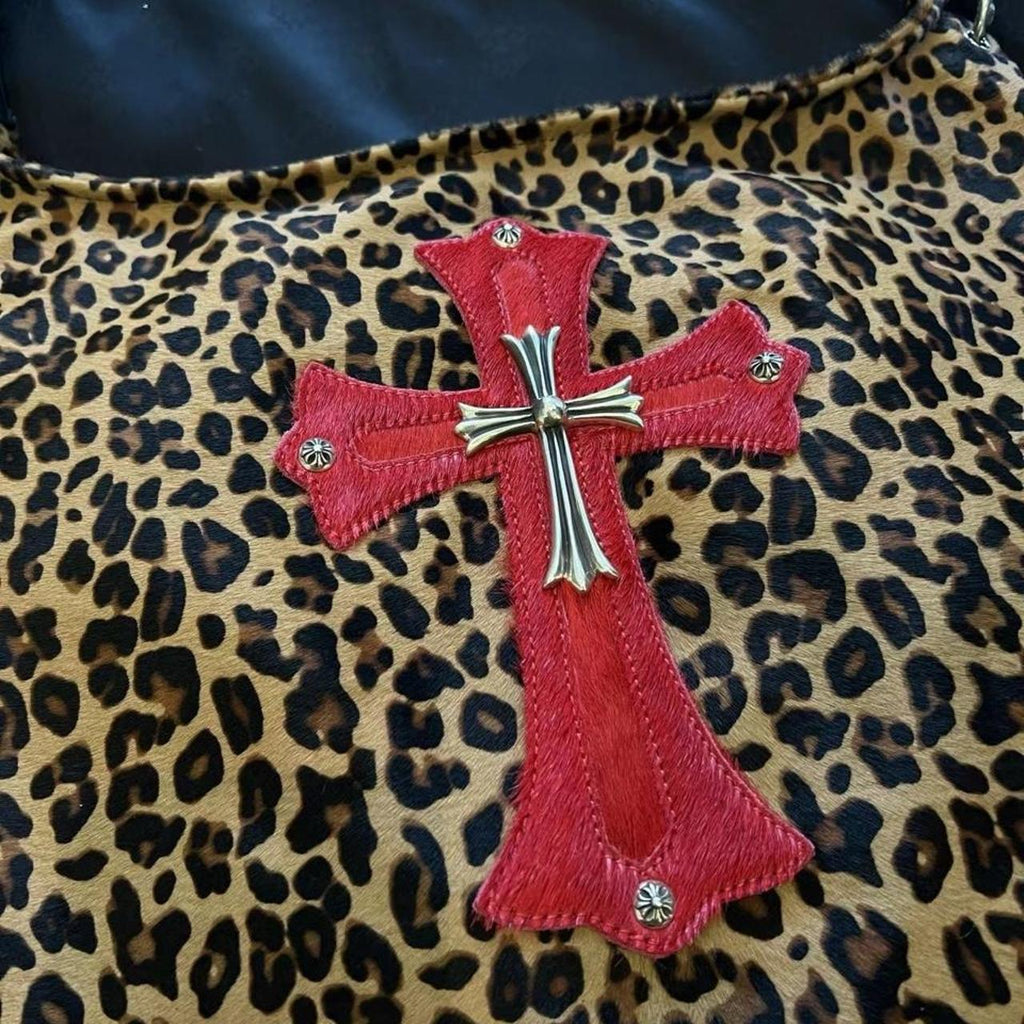 Leopard print cross purse with red cross appliqué