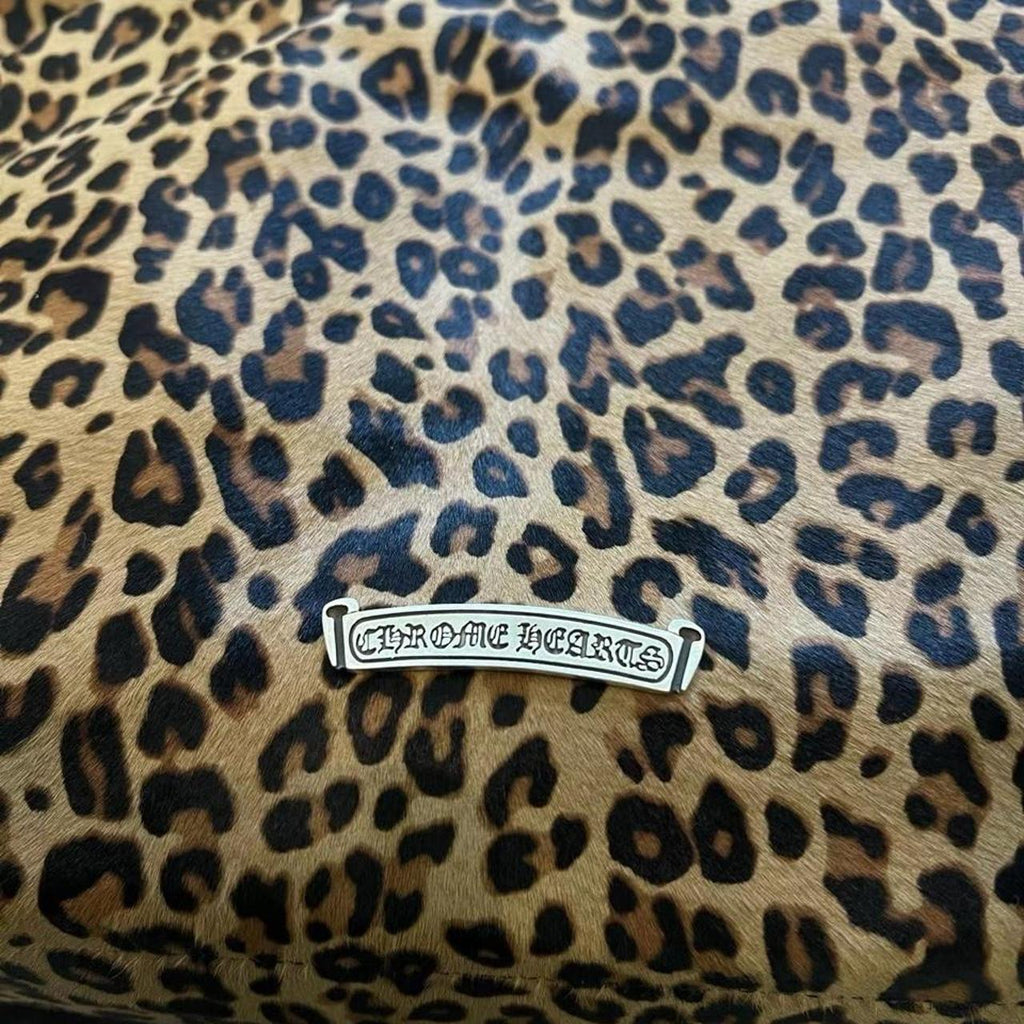 Leopard print cross purse with red cross appliqué