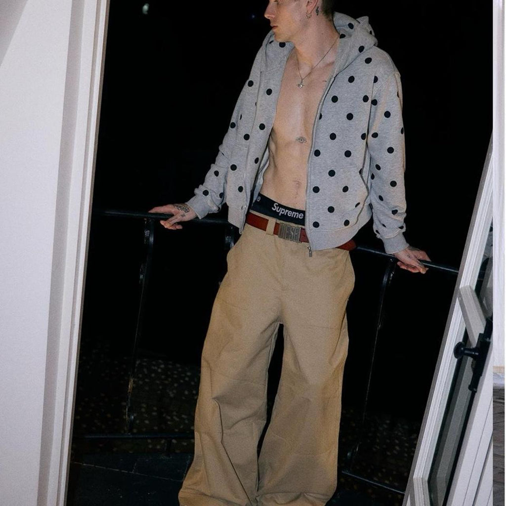 Gray zip up hoodie with black polka dots