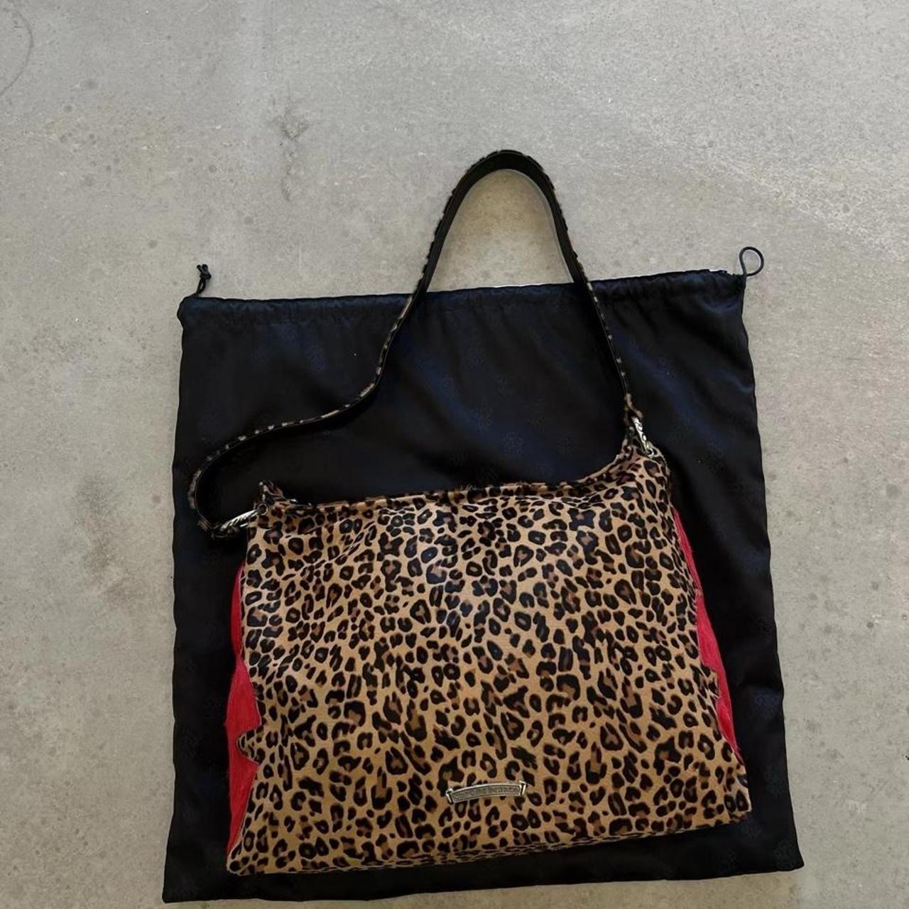 Leopard print cross purse with red cross appliqué
